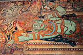 Kerala backwaters, Ettunamur the Mahadeva Temple. Painting on the inner walls of the gate show Padmnabha, the form of Vishnu reclining on the serpent 